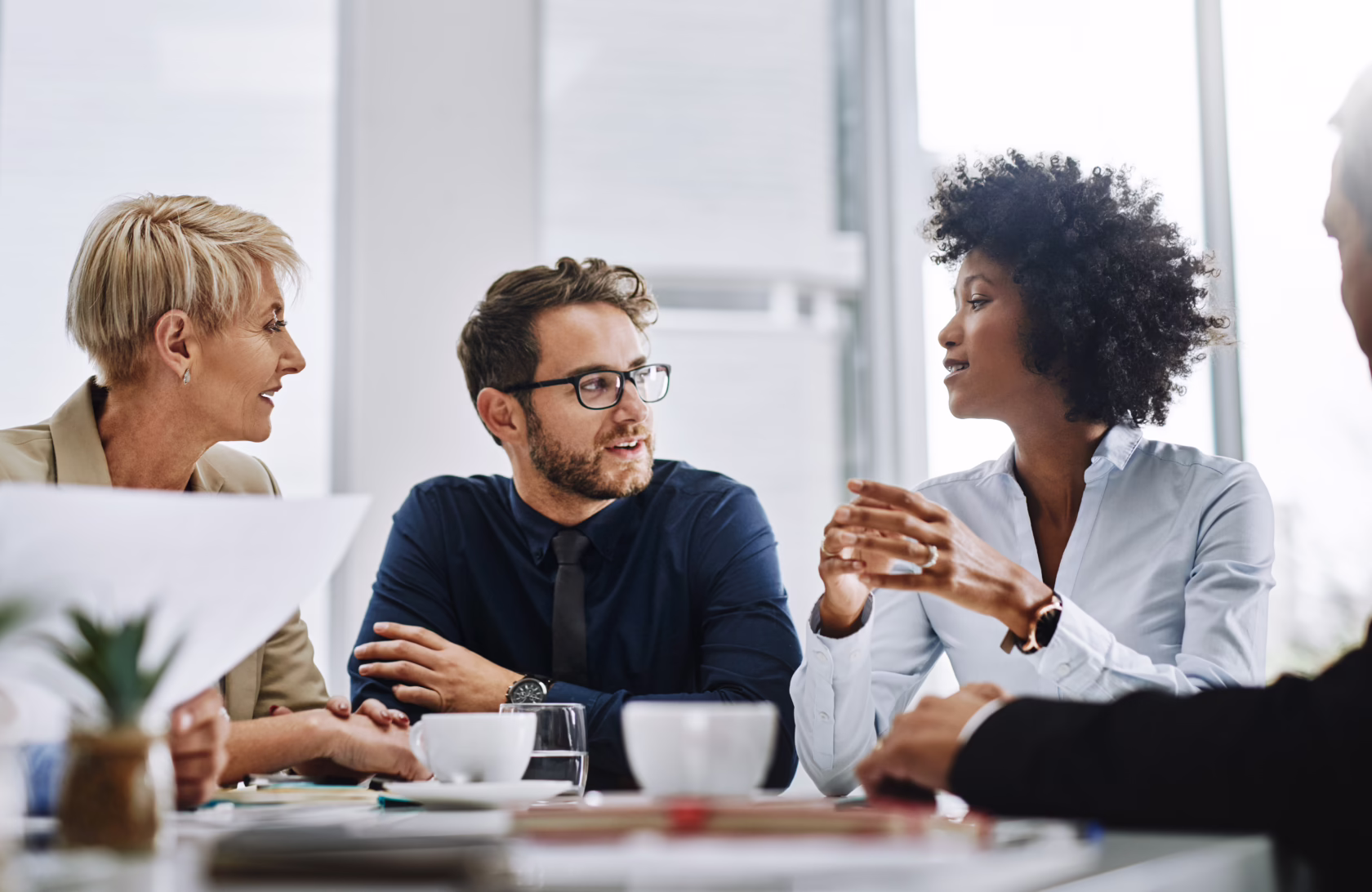 Shot of a group of businesspeople sitting together in a meeting