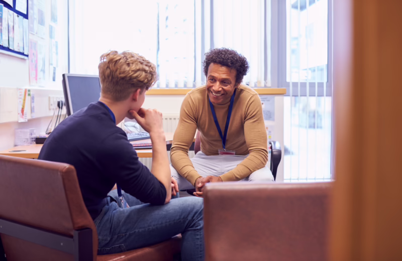Adult learner meeting with an academic advisor in a one-on-one support session.